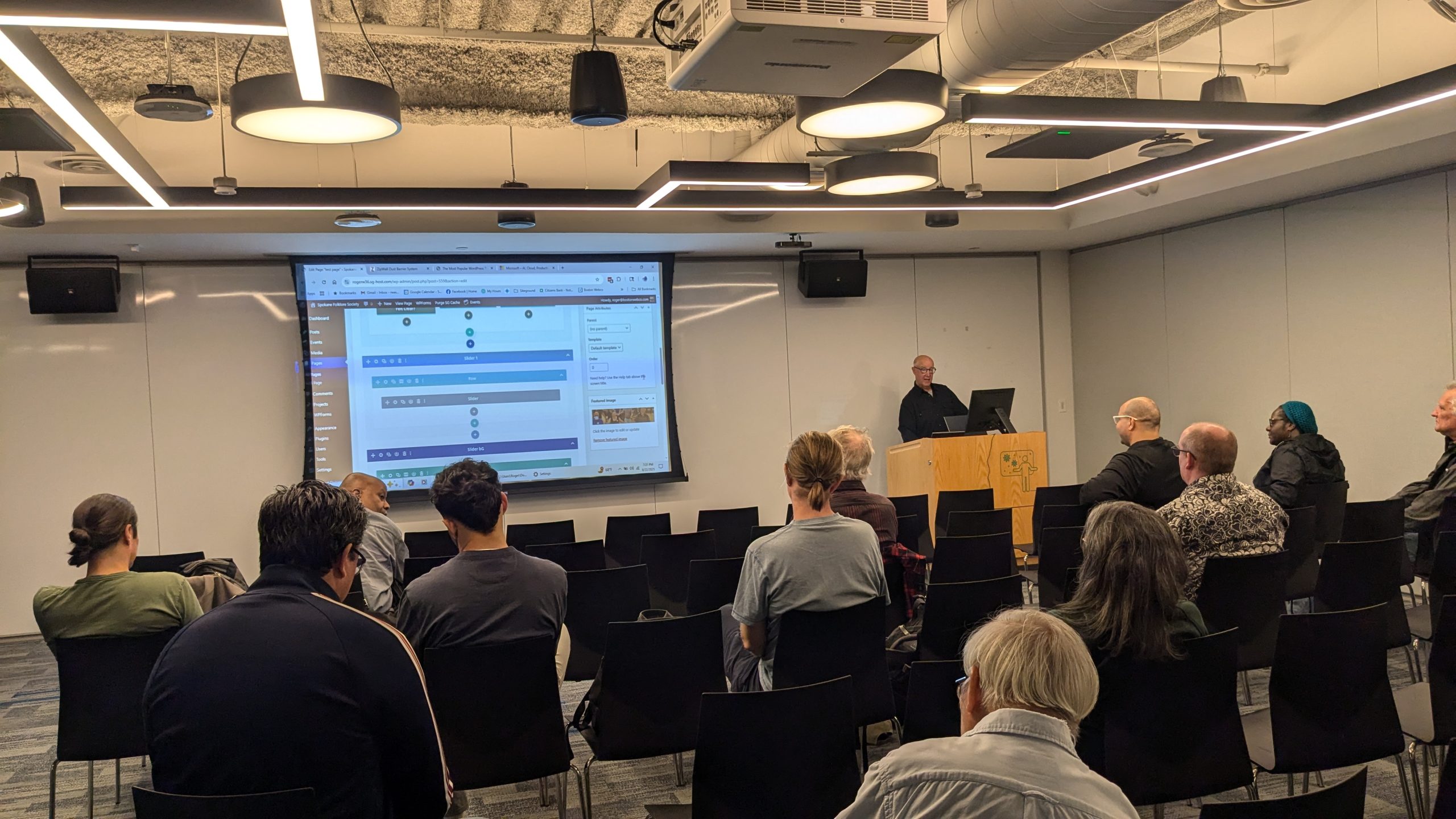 Roger Weiss giving a talk on Divi development, a WordPress page builder.